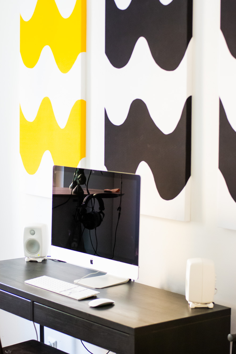 Curtained acoustic panels add a touch of flair and acoustics.
